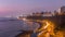 Aerial view of Lima's Coastline in the neighborhood of Miraflores day to night timelapse, Lima, Peru