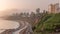 Aerial view of Lima's Coastline in the neighborhood of Miraflores during sunset timelapse, Lima, Peru