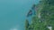 Aerial view of limestone rocks rising from water. Top view of mountains in Khao Sok National Park on Cheow Lan Lake