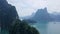 Aerial View of Limestone Rocks Rising from Water. Top View of Mountains in Khao Sok National Park on Cheow Lan Lake