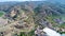 Aerial view of little small poor village next mountain in Gansu, China