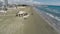 Aerial view of local relaxation facilities at sandy beach of Mediterranean Sea