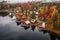 aerial view of log cabins near a serene lake