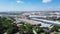 Aerial view logistic center industry warehouse near historic downtown Carrollton Square, Texas