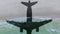 Aerial View of lonely beach with shadow of airplane