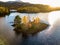 Aerial view of lonely Island in Loch Garry in the scottish Highlands, Scotland