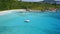 Aerial view of lonely luxury catamaran yacht in blue lagoon. La Digue island, Seychelles