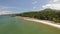 Aerial view of a long sandy beach in Lombok, Indonesia, circle around