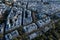 Aerial view looking down at colorful rooftops of Paris.