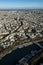 Aerial view looking down at colorful rooftops of Paris.