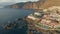 Aerial view of Los Gigantes resort on Tenerife Canary island. Flying over magnificent hotels, villas and natural pool on