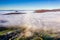 Aerial view of low level fog and cloud in a valley in the rural Brecon Beacons, Wales