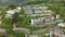 Aerial view of a luxurious beachside hotel near the shore in Phuket Bay, Thailand