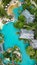 Aerial view of a luxurious resort featuring swimming pools in Phuket, Thailand