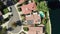 Aerial View of Luxury House With Solar Panel Array on Rooftop by Calabasas Lake