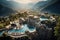 An aerial view of a luxury resort nestled in the mountains with a sparkling pool