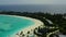 Aerial view of luxury villas over water on blue lagoon