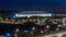 Aerial view of Luzhniki Stadium and complex from rooftop timelapse, Moscow, Russia at night.