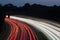 Aerial view of M1 motorway light trails in vivid color in England, United Kingdom