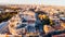 Aerial view of Madrid Cathedral Santa Maria la Real de La Almudena in Madrid, Spain and Royal Palace at sunset.