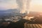 Aerial view of Mae Moh Coal Power Plant with smoke and toxic air from chimney. Factory industry. Electricity tower in energy or