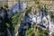 aerial view of majestic rocky mountains with green vegetation in provence