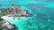 Aerial view of man kayaking in crystal clear sea water near Koh Kra island in Thailand