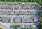 Aerial view on many car garage buildings with doors in urban area