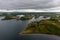 Aerial view of many sailboats anchored in the natural ocean bay near Rosmoney Pier and marina in Clew Bay