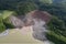 aerial view of massive landslide that has blocked a river, creating temporary lake