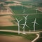 An aerial view of a massive wind farm with rows of turbines harnessing renewable energy2