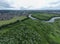 Aerial view of a meander of the River Mersey in Warrington, Cheshire with Paddington Meadows behind