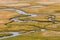 An aerial view of meandering stream. Plateau Ukok. Altai