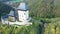 Aerial view of medieval Karlstejn castle in autumn park, Czech Republic