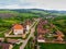 Aerial view. Medieval Saxon Church in Saschiz Village, Transylvania, Romania. Unesco World Heritage Site. fortified church and the