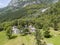 Aerial view of the Mello Valley, a valley surrounded by granite mountains and forest trees, renamed the little italian Yosemite