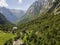 Aerial view of the Mello Valley, a valley surrounded by granite mountains and forest trees, renamed the little italian Yosemite