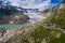 Aerial view of the melting Rhone glacier and the glacial lake in the Swiss Alps