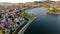 Aerial view of Menifee Lake and neighborhood, residential subdivision vila during sunset.