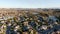 Aerial view of Menifee Lake and neighborhood, residential subdivision vila during sunset.