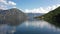 Aerial view of the mesmerizing clear expanse of a blue mountain lake