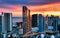 Aerial View of Miami City at Sunset With Tall Buildings. Capture the breathtaking beauty of a Miami cityscape at sunset,