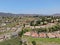 Aerial view of middle class neighborhood with residential house community, South California