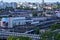 Aerial view of the Minsk-Sortirovochny railway station with freight rail wagons and urban areas located in the southwestern part