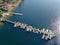 Aerial view of Miramar Lake small pier with pedal boat, small motor boat.