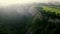 Aerial view with mist around the waterfall of Gujuli, Spain.