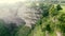 Aerial view with mist around the waterfall of Gujuli, Spain.