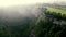 Aerial view with mist around the waterfall of Gujuli, Spain.