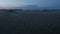 Aerial view misty icelandic highlands at night. Moonscape panorama. Dramatic foggy misty drone of moonscape valley in