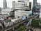 Aerial view of modern city bangkok with building and sky train transportation